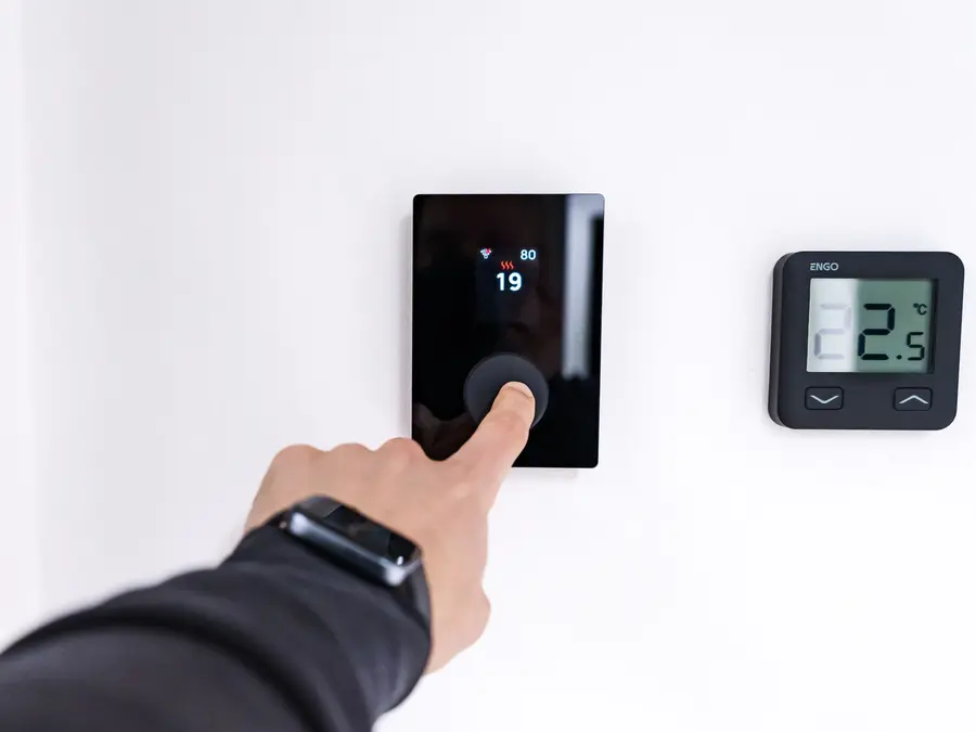 Adjusting a modern wall thermostat